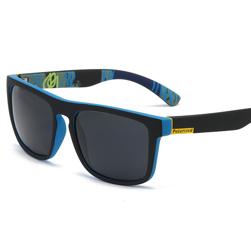 Polarized sports sunglasses with blue frame, green pattern arms, and dark square lenses