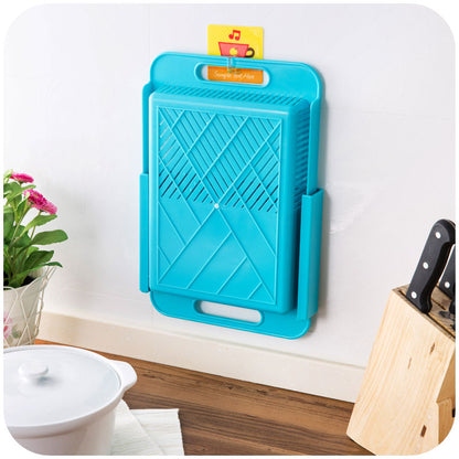 Blue cutting board with geometric pattern on a kitchen counter
