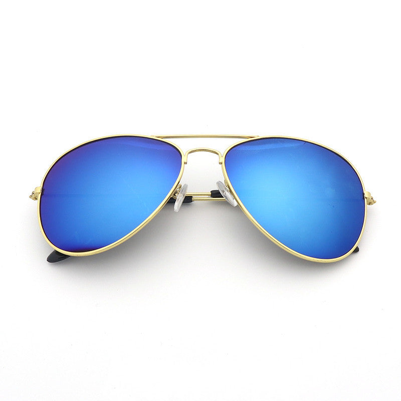 Unisex sunglasses with gold frame and cool blue gradient mirrored lenses, aviator.