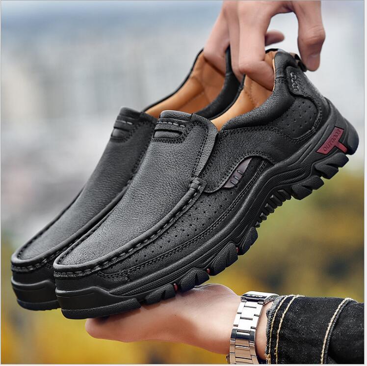 Men's outdoor leather shoes, black slip-on with perforated trim and rugged tread sole