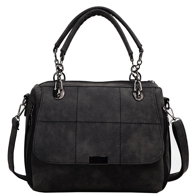 Women’s shoulder matte bag, black with quilted front flap and chain-ring handles