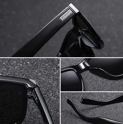 Black men’s sunglasses close-up with logo temple and tinted lenses