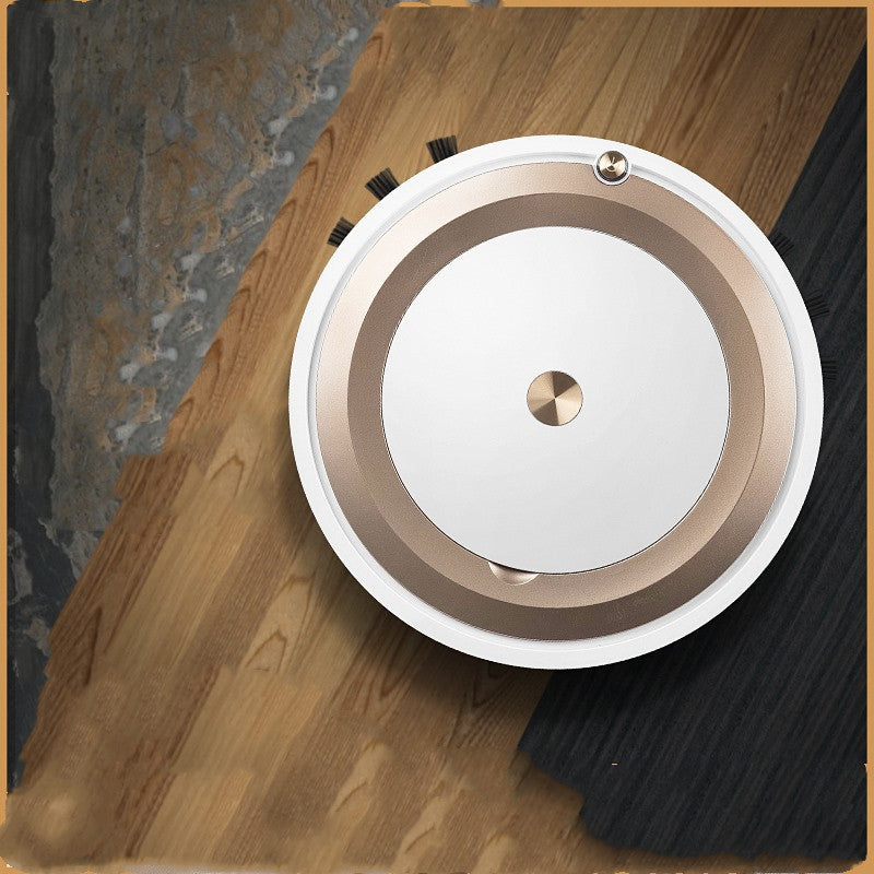 Round smart robot vacuum with gold center cap and brown outer ring