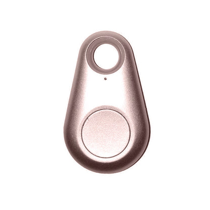 Rose gold keychain tracker on a white background