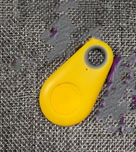 Yellow object on a textured surface. YAXSO UAE ONLINE STORE