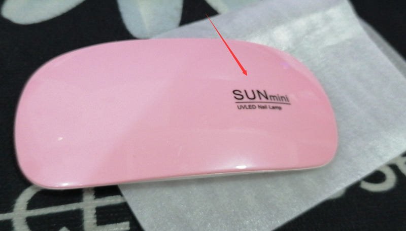 Pink SUNmini mini UV LED nail lamp, curved portable USB dryer