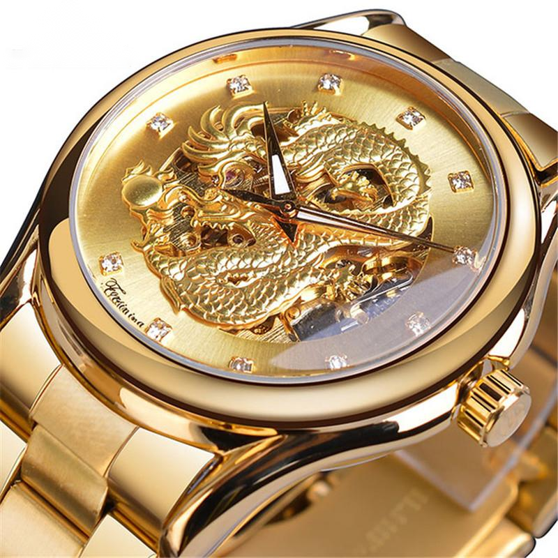 Gold watch with dragon design on the dial