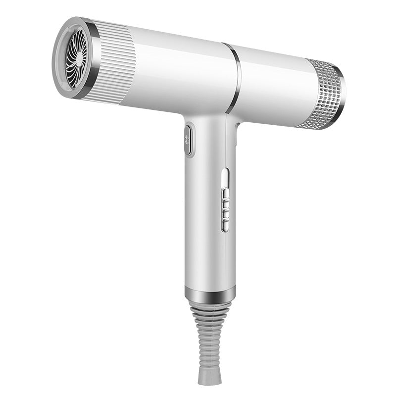 White household hair dryer with concentrator nozzle and coiled power cord