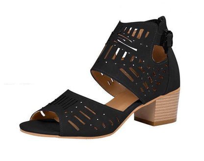Black open-toe sandal with cut-out design and wooden block heel on a white background