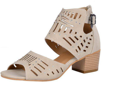 Beige sandal with cut-out design and block heel on a white background