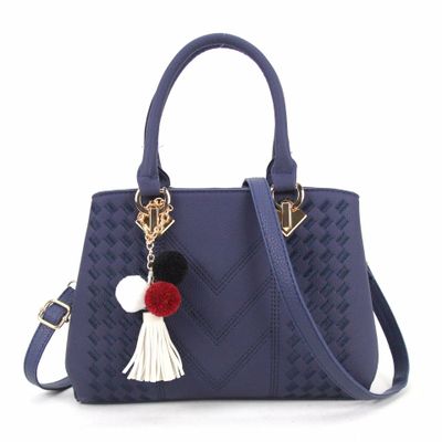 Women's crossbody handbag, blue PU leather with textured pattern and pom tassel charm