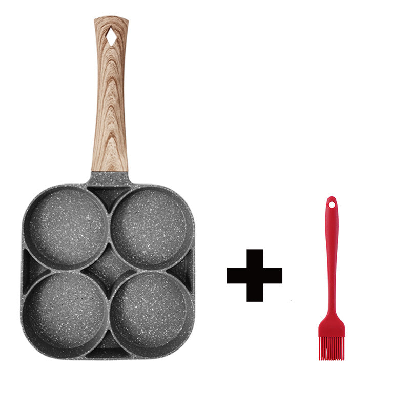 Frying pan with wooden handle and red brush on white background