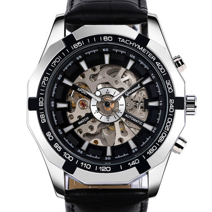 Luxury watch with black face and leather strap on a white background