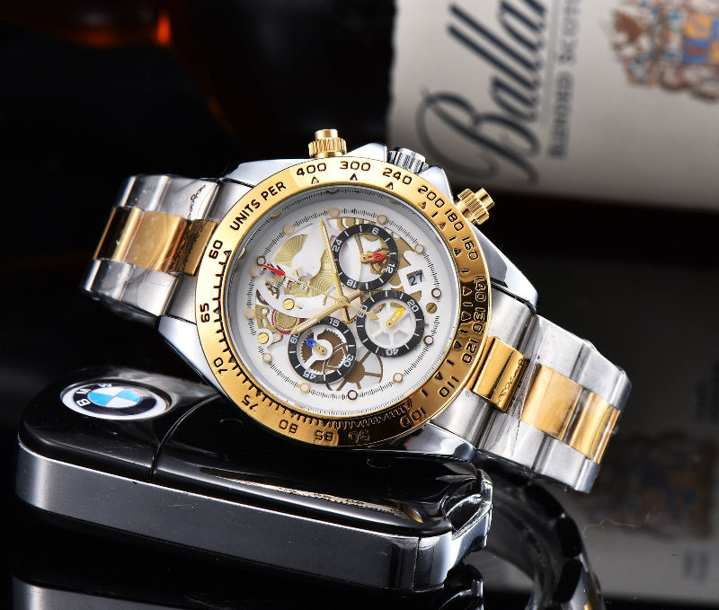 Men's quartz watch with steel link strap, champagne dial, gold-tone bezel.