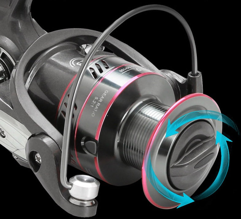 Metal fishing reel close-up of spool with pink ring and silver line guide