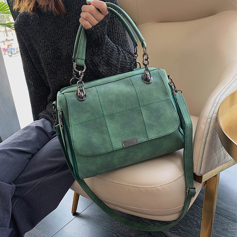 Women’s shoulder matte bag, green quilted front flap with chain-ring handles