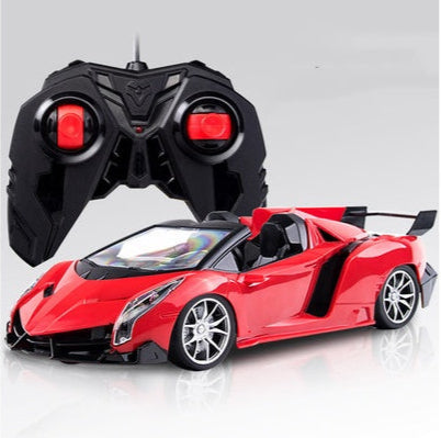 Red toy car with a black remote control. YAXSO UAE ONLINE STORE