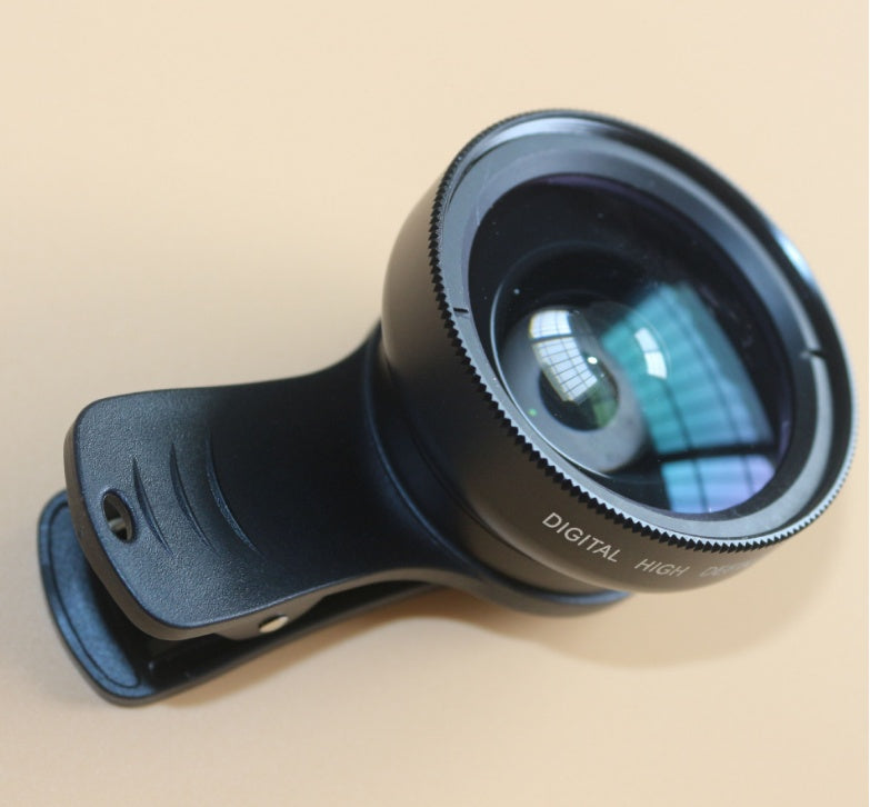 Black clip-on phone lens with wide-angle glass and ridged focus ring