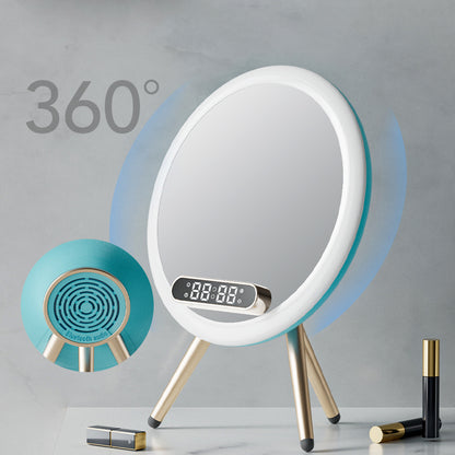 360-degree rotating mirror with digital clock and light on a gray background