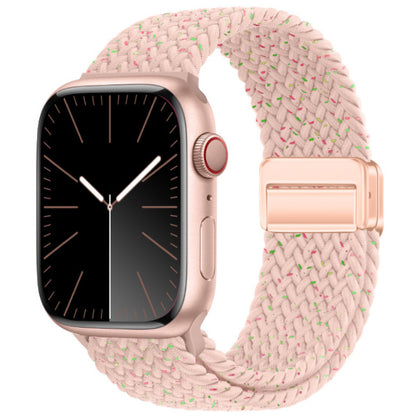 Smartwatch with a pink woven band on a white background