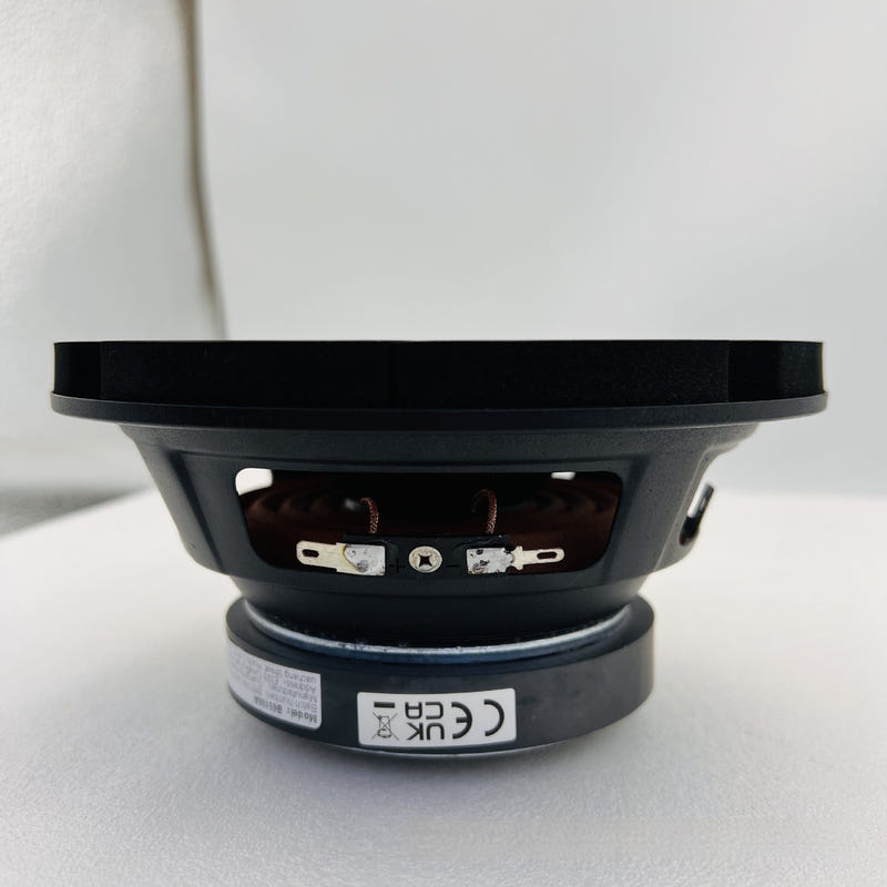 Car woofer speaker back view with label and connection terminals on base