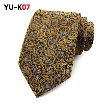 Patterned tie with blue and brown design on a white background