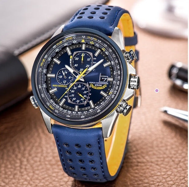 Blue wristwatch with detailed face on a brown textured surface