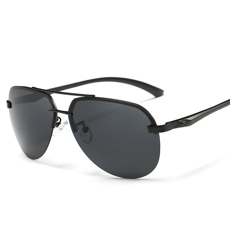 Black sunglasses with dark lenses on a white background