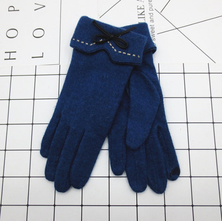 Pair of blue gloves on a grid background