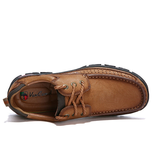 Brown leather shoe with visible brand logo on a white background