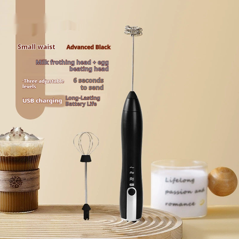 Black handheld electric milk frother with whisk attachment and base stand