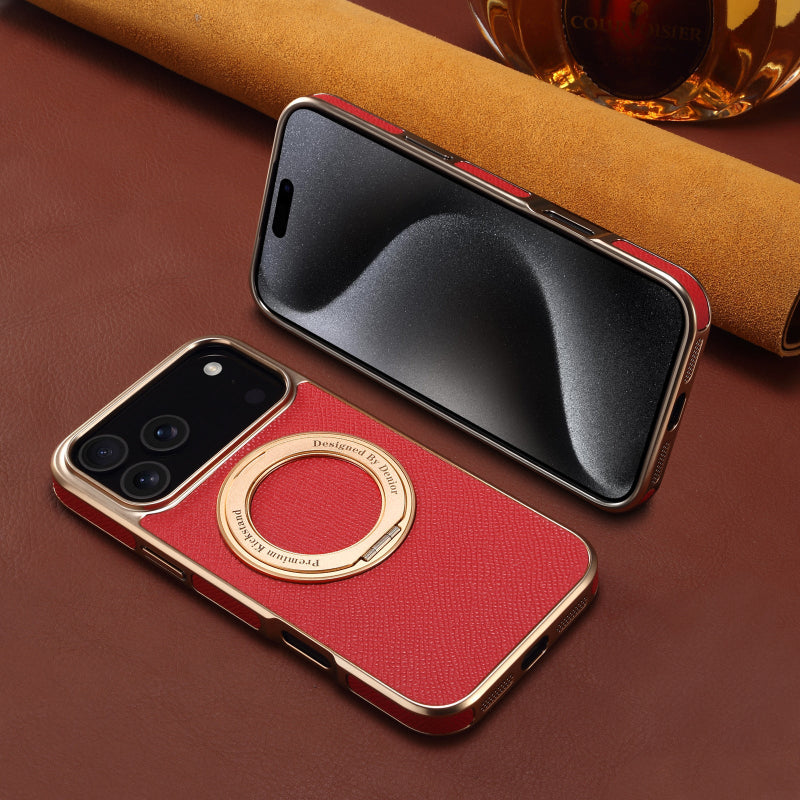 Red phone case with gold accents on a brown surface