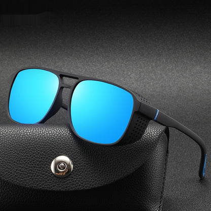 Sunglasses with blue lenses on a black leather case against a dark background