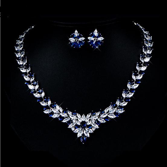 Rhinestone flower necklace and stud earring set with blue stones