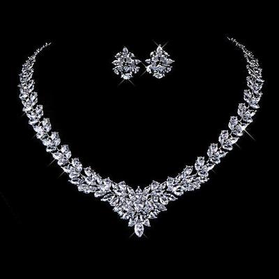 Rhinestone flower bib necklace with stud earrings and clear crystal stones