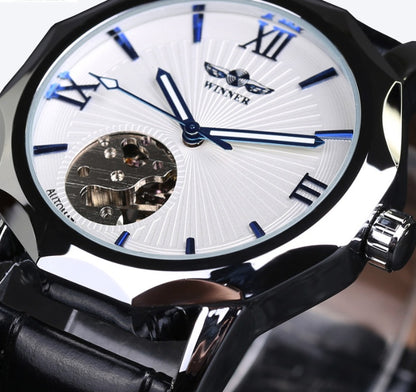 Men's automatic mechanical watch close-up: white dial, blue hands, skeleton window, black leather