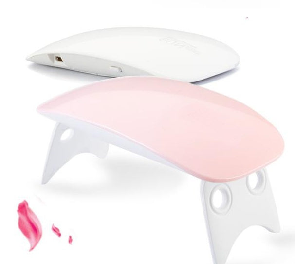 Pink and white portable USB LED nail lamps with compact, curved design