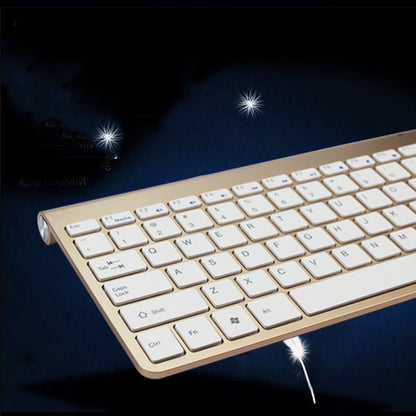 Gold and white keyboard on a dark background