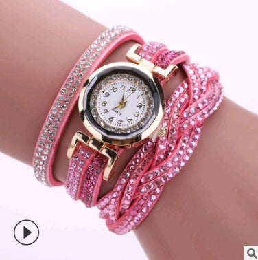 Ladies quartz watch bracelet with pink leather strap and rhinestone bezel
