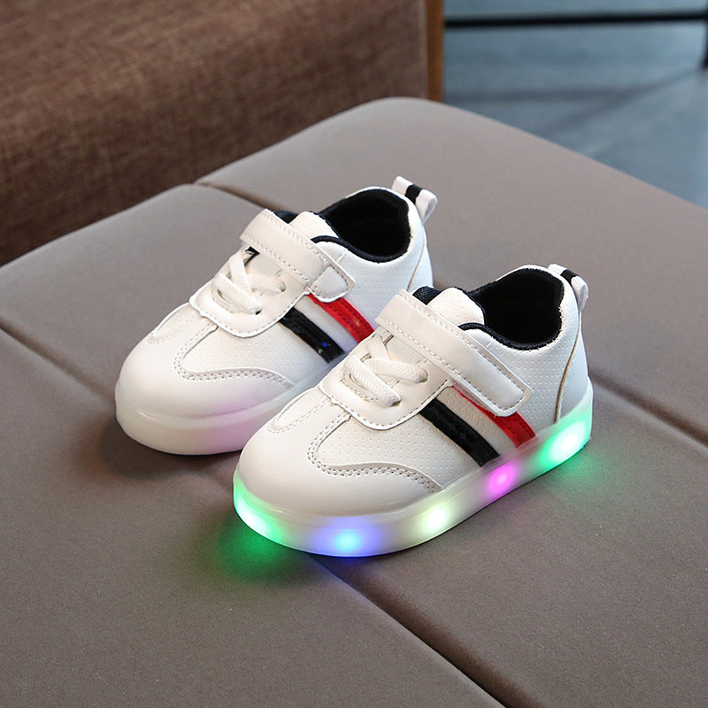 Kids light-up sneakers, white with blue-red side stripes and glowing LED sole