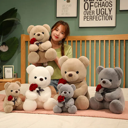 Woman holding a collection of teddy bears. YAXSO UAE ONLINE STORE