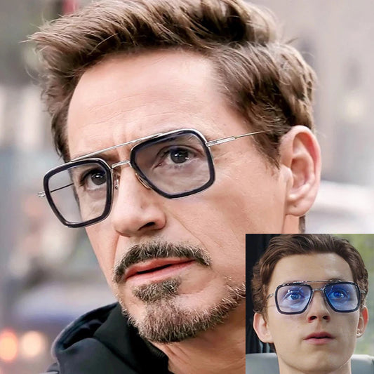 Close-up of a person wearing glasses with a blurred background