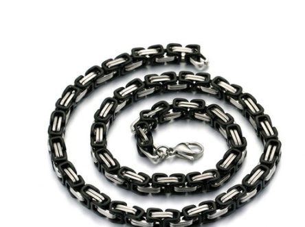 Black and silver chain necklace on a white background