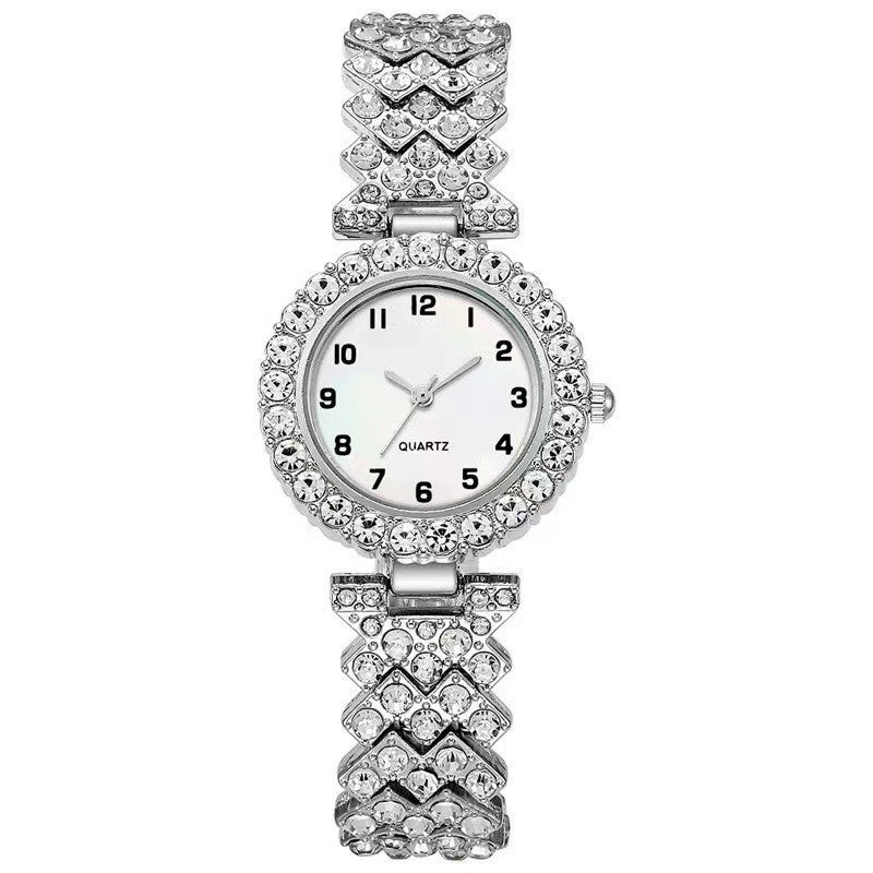 Silver-tone rhinestone-style watch with white dial and heart-link band