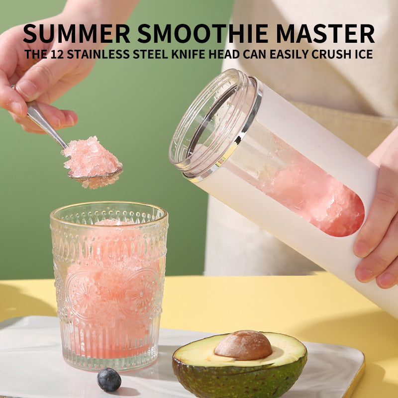Portable rechargeable juice blender pouring pink smoothie into a clear glass.