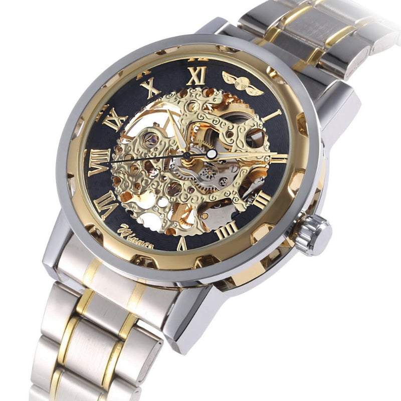 Silver and gold watch with a detailed mechanical face on a white background