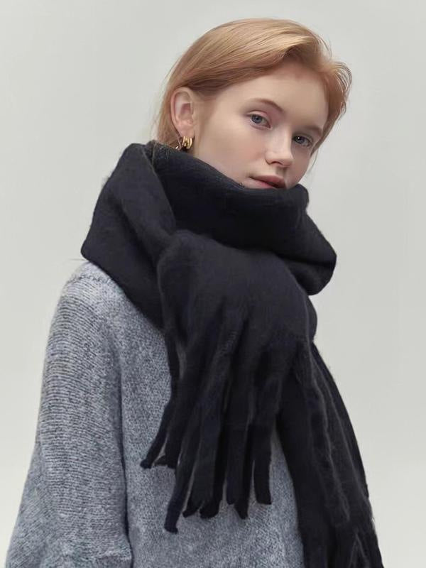 Women's wool-like scarf, black, fringed ends, wide cowl-style drape around the neck