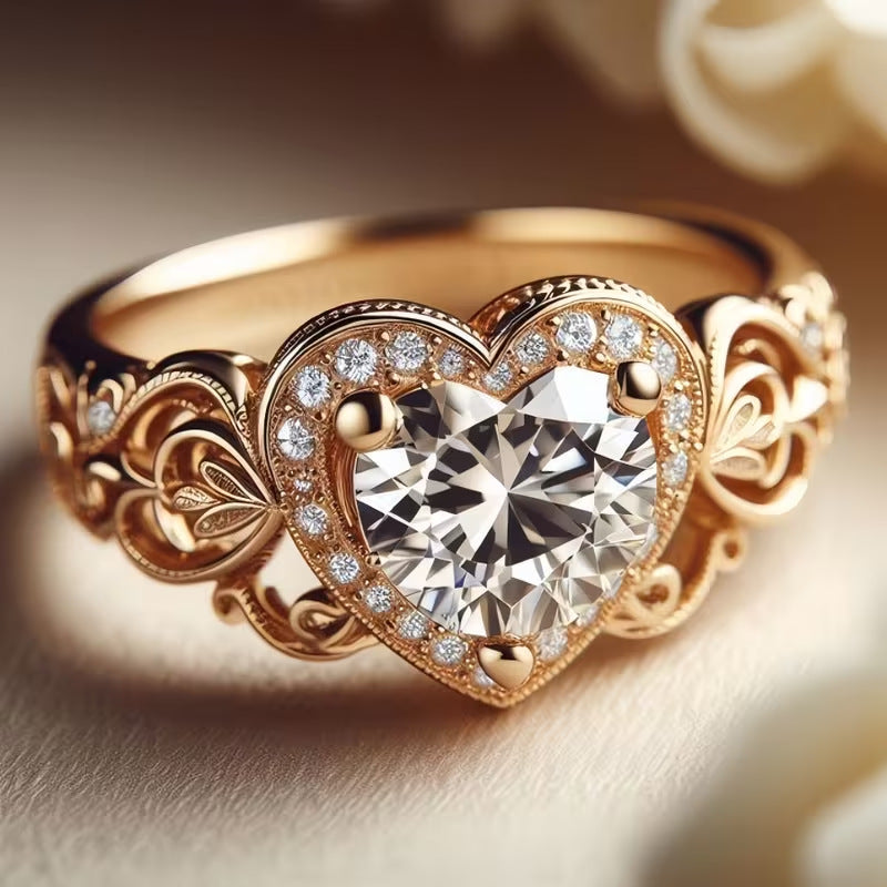 Gold heart zircon ring with heart-shaped center stone and filigree band