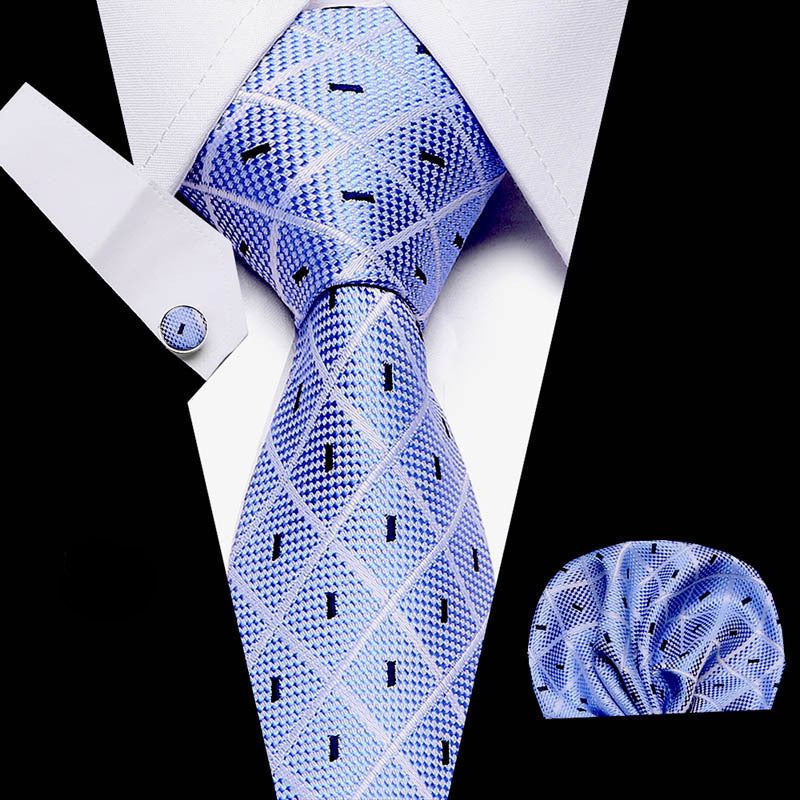 Men's business tie in light blue with geometric check and small square motif