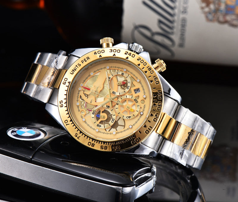 Men's quartz watch with steel link strap, champagne dial, gold-tone bezel.